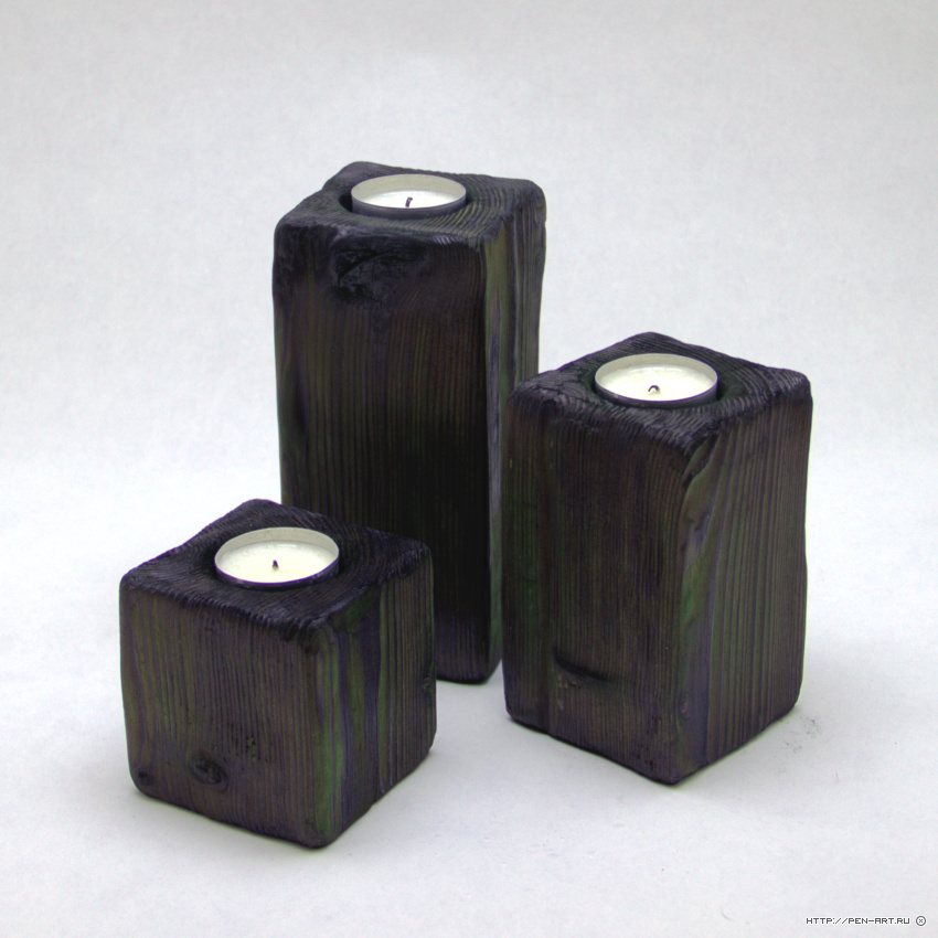 Candle holders from burnt pine